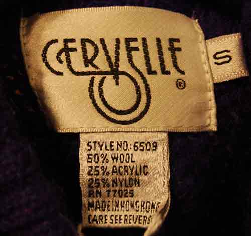 Close-up of Cervelle brand wool blend sweater-coat label in size small with material composition and care information.