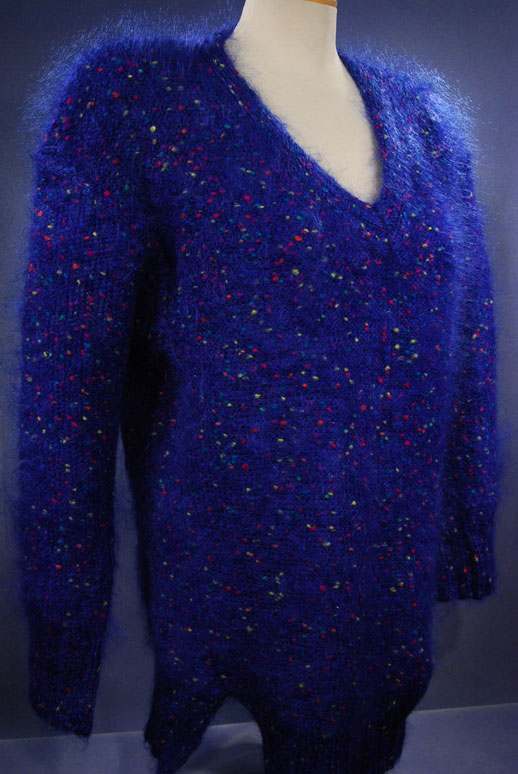 Woman's blue speckled mohair V-neck sweater with multicolor knit specks in small-medium size
