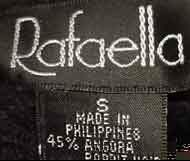 Woman's black angora crewneck sweater by Rafaella with vertical ribbing, size medium (44)