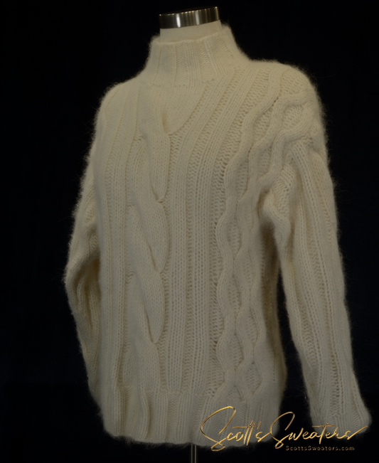 Woman's cabled mock-turtleneck sweater made of soft angora, lambswool, and nylon blend