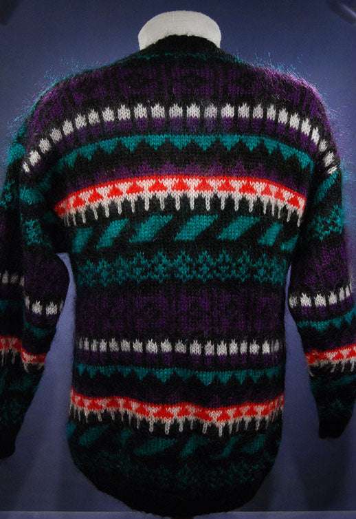 Woman's black multi-color striped mohair crewneck sweater back view