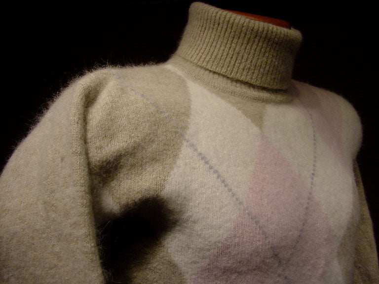 Woman's tan argyle angora-lambswool turtleneck sweater with front diamond pattern