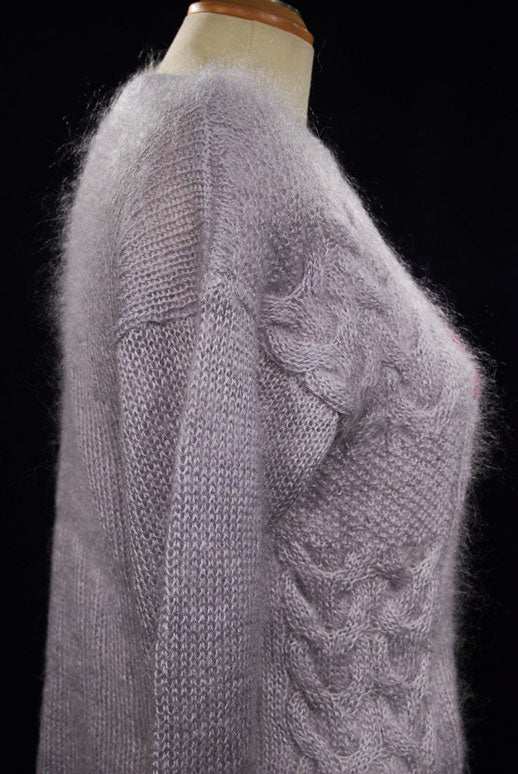 Woman's lavender mohair crewneck sweater with textured floral pattern and soft fuzzy knit