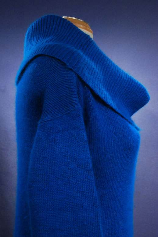 Woman wearing a royal-blue silk-angora cowlneck sweater by Reference Point, size small