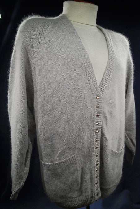 Woman's grey silk-angora cardigan sweater with 14 pearl-like buttons and front pockets, medium size