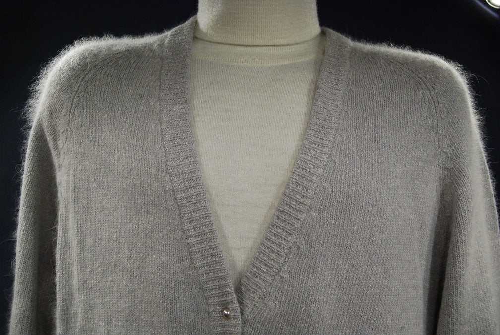 Woman's grey silk-angora cardigan sweater with pearl-like buttons in medium size