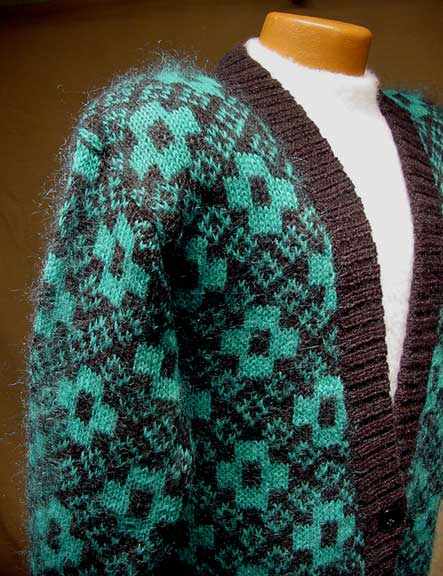 Woman's retro green and black mohair-blend cardigan sweater with deep V-neck in plus size 50