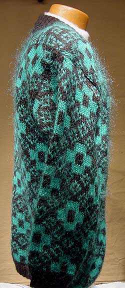 Plus-sized woman's retro green and black mohair blend deep V-neck cardigan sweater
