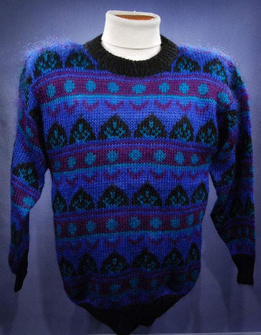 Woman's blue multi-colored retro mohair crewneck sweater with black trim by Gallagher
