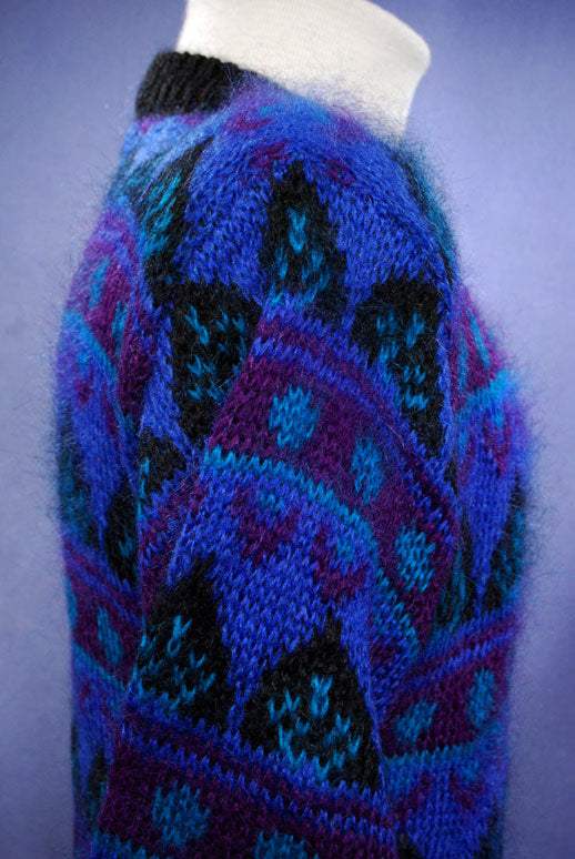 Woman's blue multi-colored retro crewneck mohair sweater with black trim by Gallagher