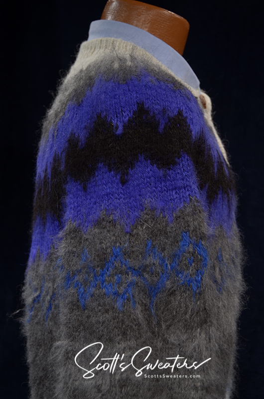 Unisex soft grey alpaca cardigan with white trim and blue-black yoke design by Rey Wear, size Small-Medium.