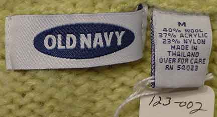 Woman's pale-green wool-acrylic turtleneck sweater by Old Navy with size tag showing medium but fits x-small to small