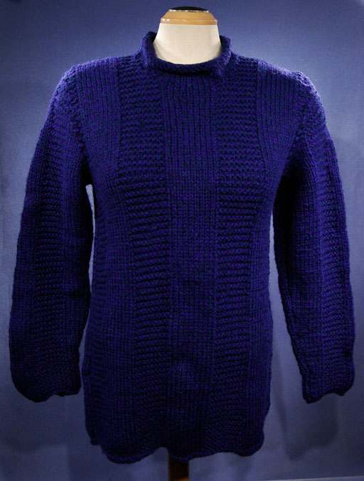 Woman's dark-blue hand-knit wool-acrylic rollneck sweater on mannequin, size X-Small