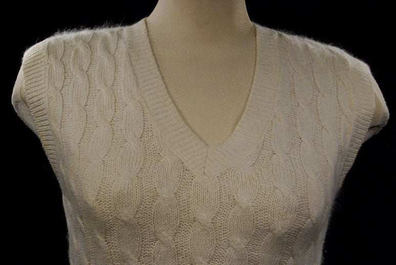 Woman's white silk-cotton-angora cable-knit sweater vest with V-neck and sleeveless design