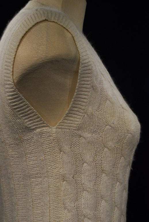 Woman's white silk-cotton-angora cable-knit sweater vest small size on mannequin