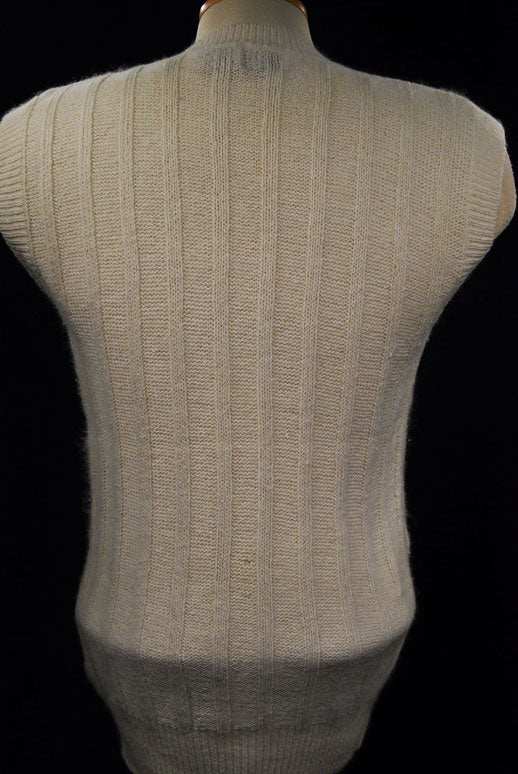 Woman's white silk-cotton-angora cable-knit sweater vest back view