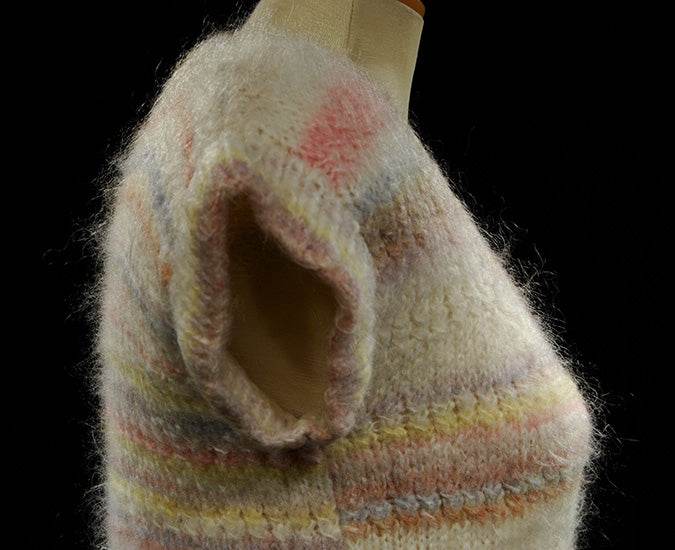 Hand-knit white sleeveless sweater vest with pastel horizontal stripes, round neck, X-small size.