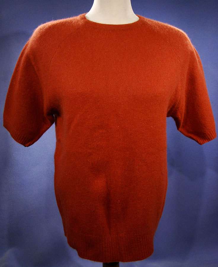 Woman's burnt-orange short-sleeved angora sweater by Claud Vernet size 42