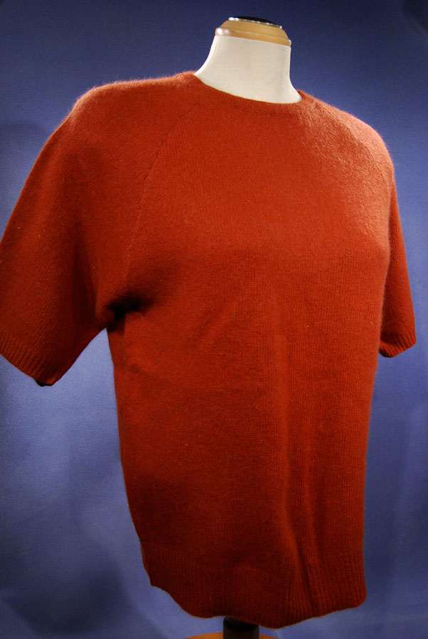 Woman's burnt-orange short-sleeved angora lambs-wool sweater by Claud Vernet