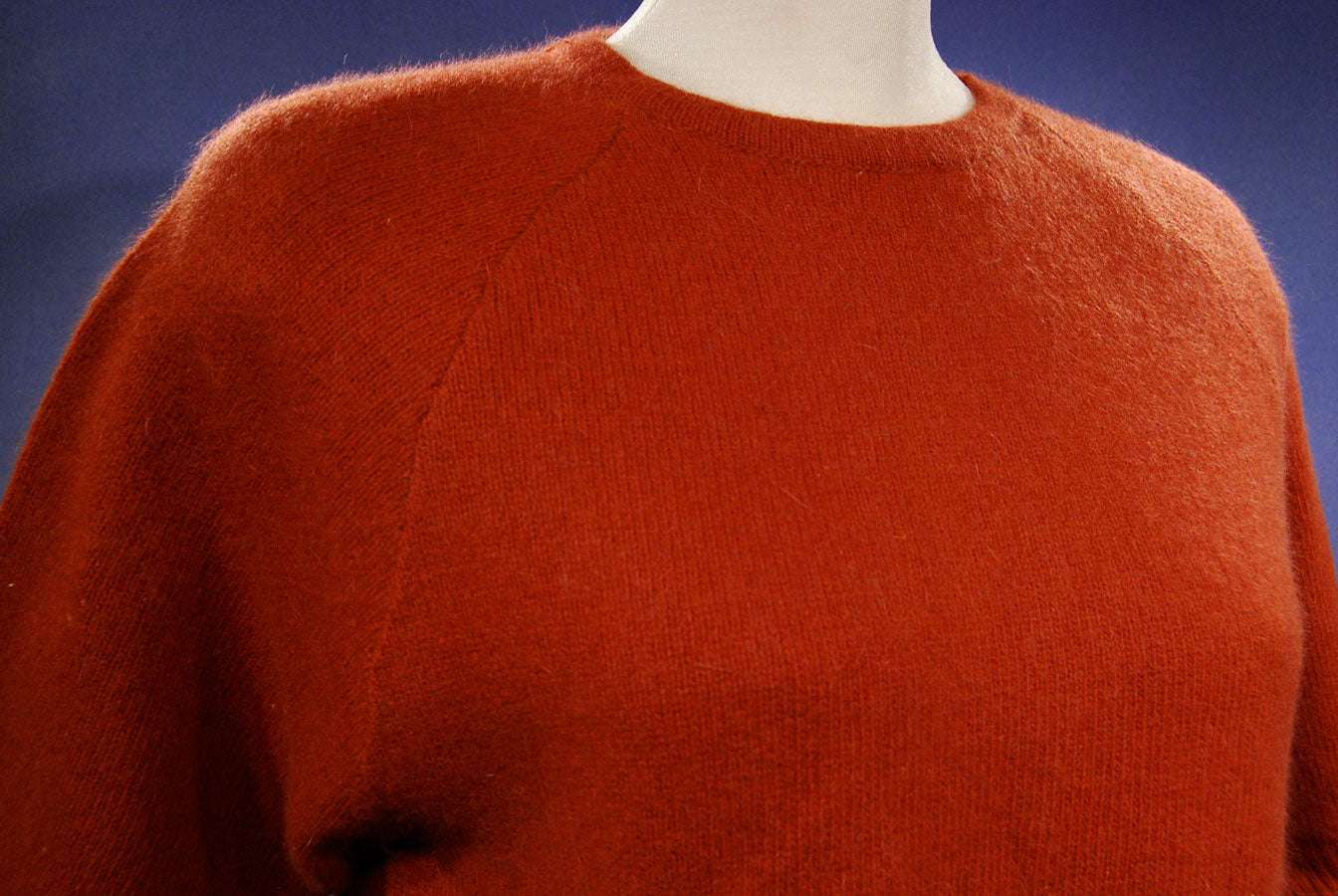 Woman's burnt-orange short-sleeved angora sweater with jewel neck by Claud Vernet, size 42