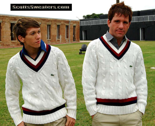 Men's classic retro Izod tennis sweaters in white cable knit with burgundy and navy striped V-neck collars and waistbands.