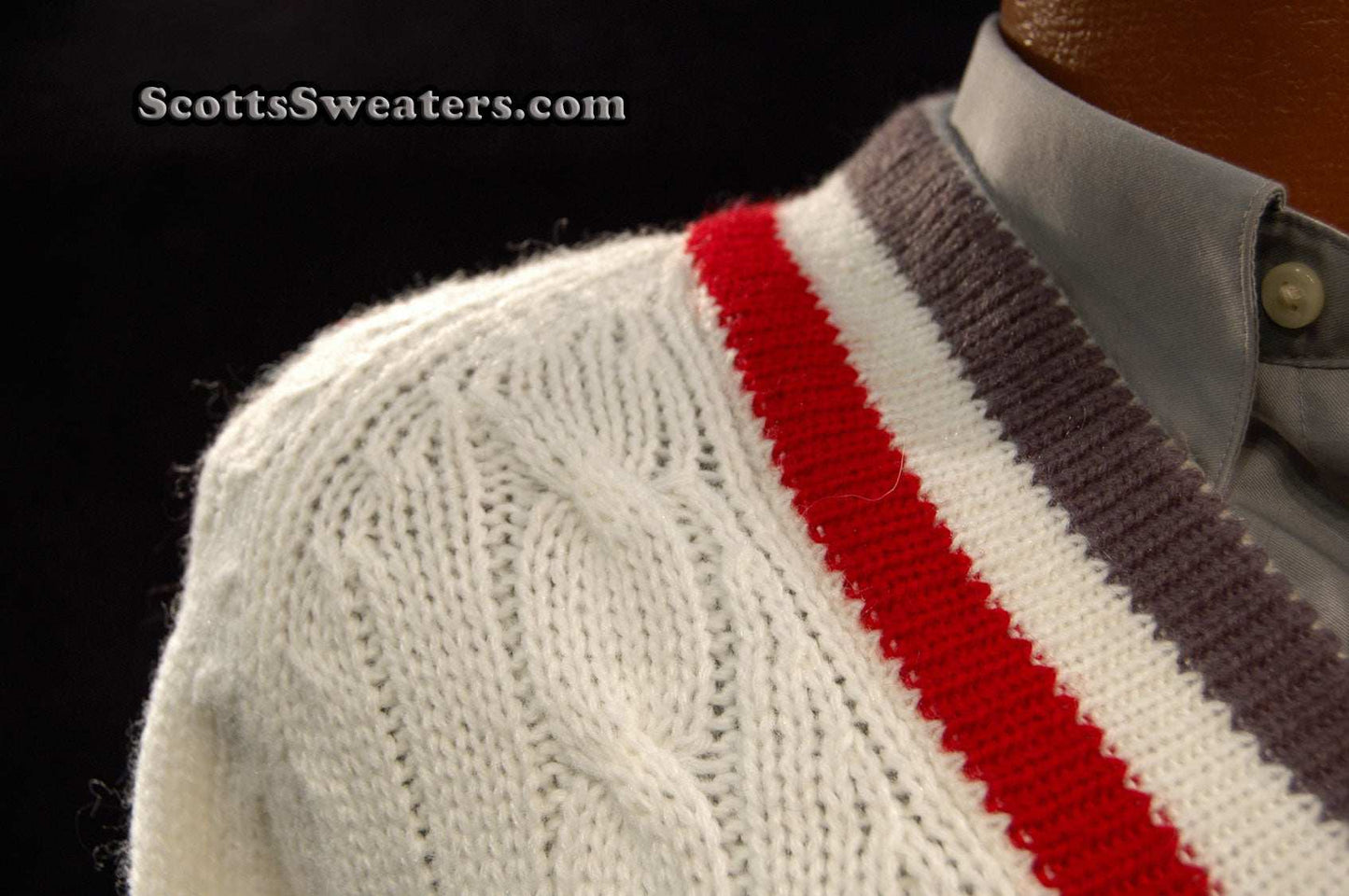 Men's classic retro Izod tennis sweater with grey and red striped trim and cable knit pattern