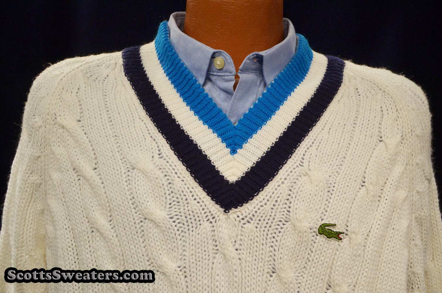 Men's classic retro Izod cable-knit tennis sweater with black and blue stripes and Lacoste crocodile logo