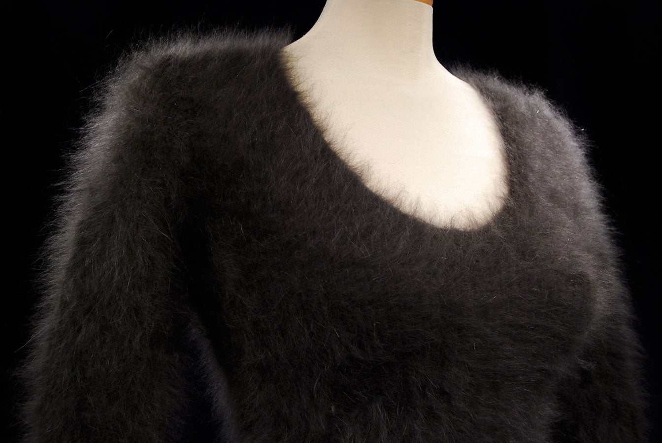 Woman's sexy cropped 3/4-sleeve angora sweater in dark sable with cling-fit ribbed texture and V-neck design
