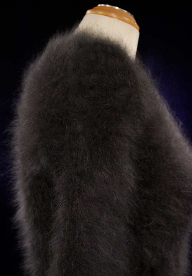 Woman's sexy cropped 3/4-sleeve fuzzy angora sweater in dark sable color on mannequin