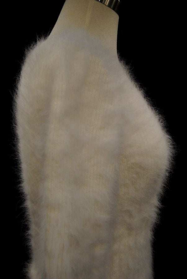 Woman's sexy cropped 3/4-sleeve angora ribbed cling-fit sweater in soft beige