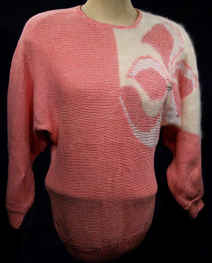 Woman's beaded-pink angora sweater with large white floral design on left shoulder by David Brett size 36
