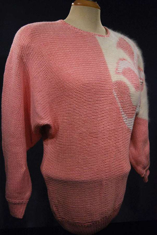 Woman's beaded-pink angora sweater with large white beaded design on left shoulder by David Brett, size 36