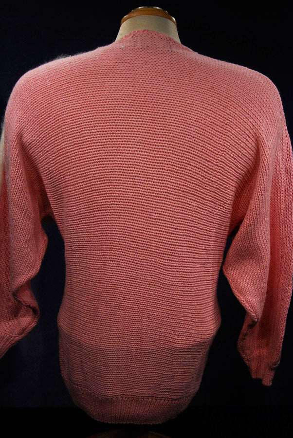 Back view of woman's beaded-pink angora sweater by David Brett size 36