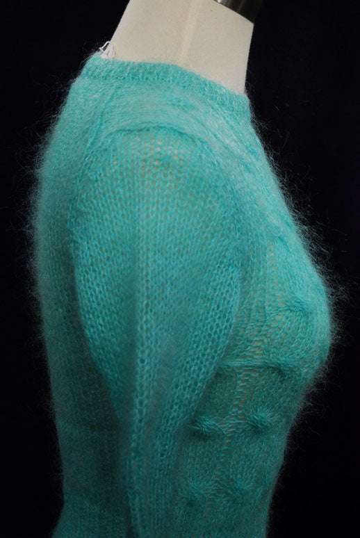 Girl's pale-green short-sleeve mohair sweater in aqua green with crewneck style