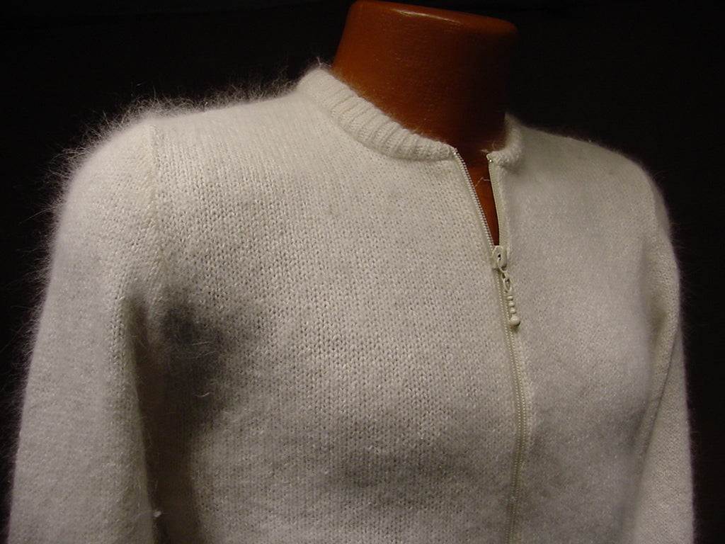 Teen girl's cropped natural white silk-angora zipper-front cardigan sweater on mannequin