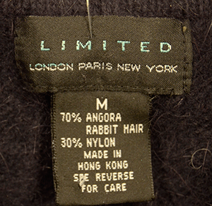 Woman's navy-blue short-sleeve angora sweater label by The Limited medium size