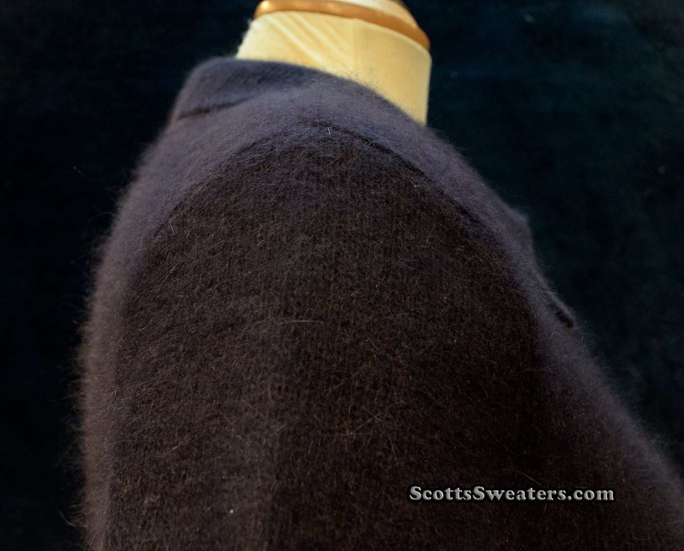 Woman's navy-blue short-sleeve angora polo-neck sweater by The Limited, soft and fuzzy texture, medium size