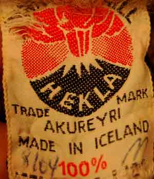 Men's retro Icelandic wool crewneck sweater label showing Hekla Knitting Mill branding and 100% wool made in Iceland