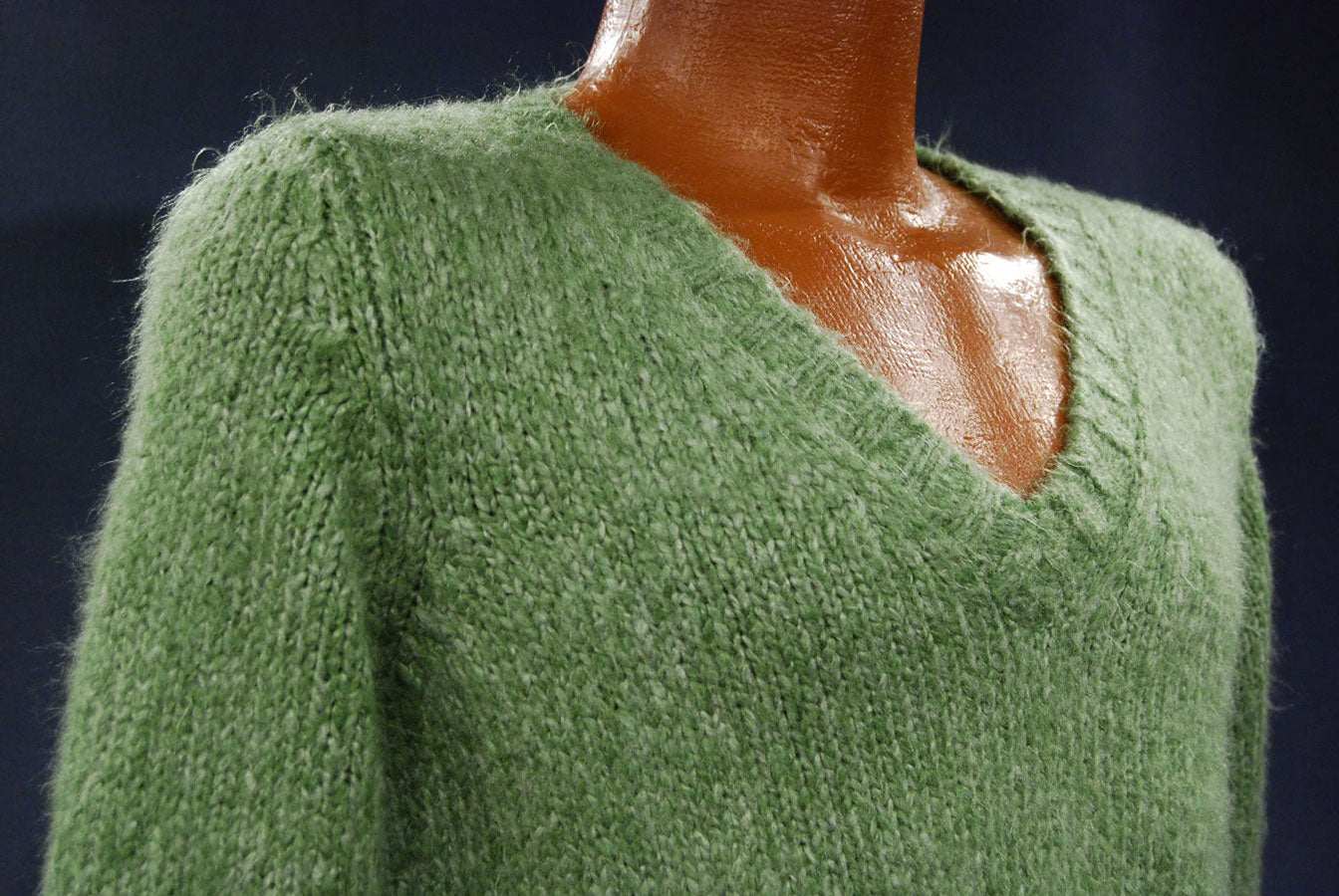 Woman's sage-green fuzzy V-neck sweater pullover in small-medium size