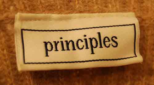 Principles brand label on tan angora wool turtleneck sweater