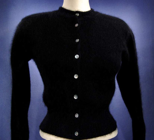 Woman's black angora button-front round-neck cardigan sweater by Express Tricot in X-Small