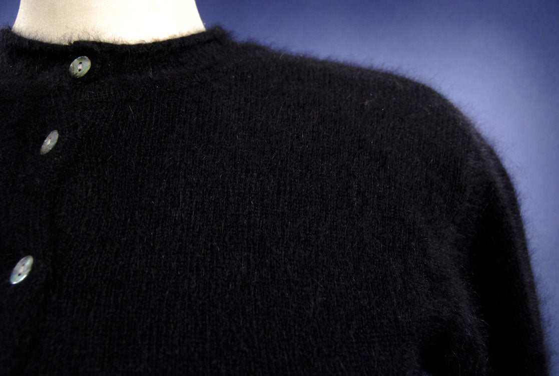 Woman's black angora button-front round-neck cardigan sweater by Express Tricot X-Small