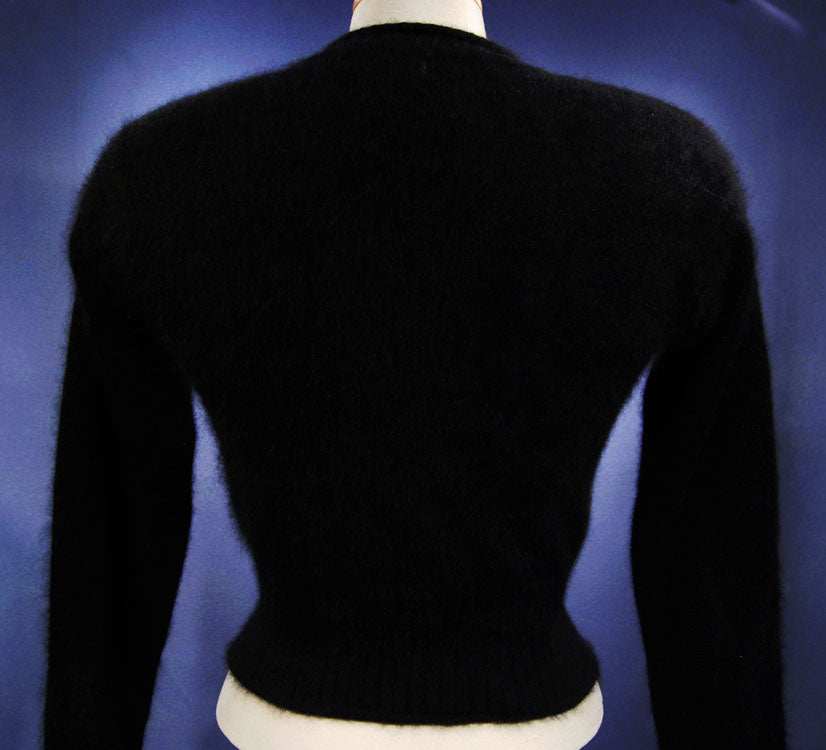 Women's black angora cardigan sweater by Express Tricot, X-Small, back view with round neck and long sleeves.