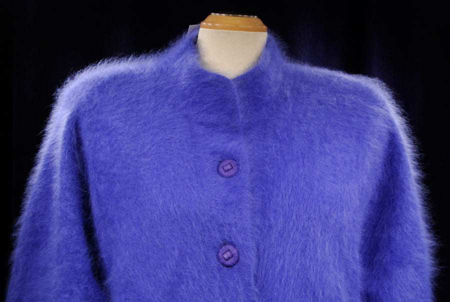 Woman's powder-blue angora cardigan sweater by Venesha with buttons and nylon lining