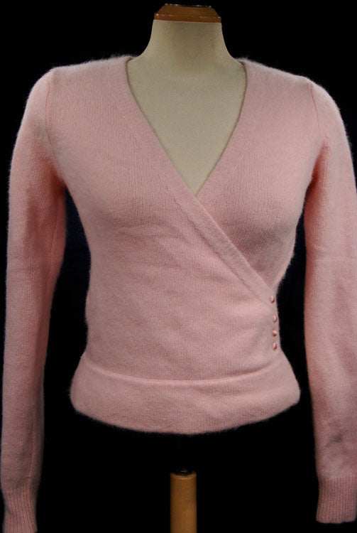 Woman's pink angora-lambswool crossover wrap cardigan sweater with side buttons