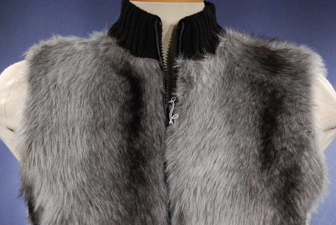 Girl's grey and black faux-fur sleeveless vest with front zipper and rib-knit collar and waist