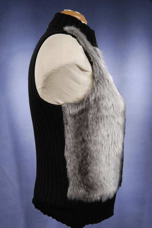 Girl's/Woman's grey and black faux-fur sleeveless vest with front zipper and rib-knit trim.