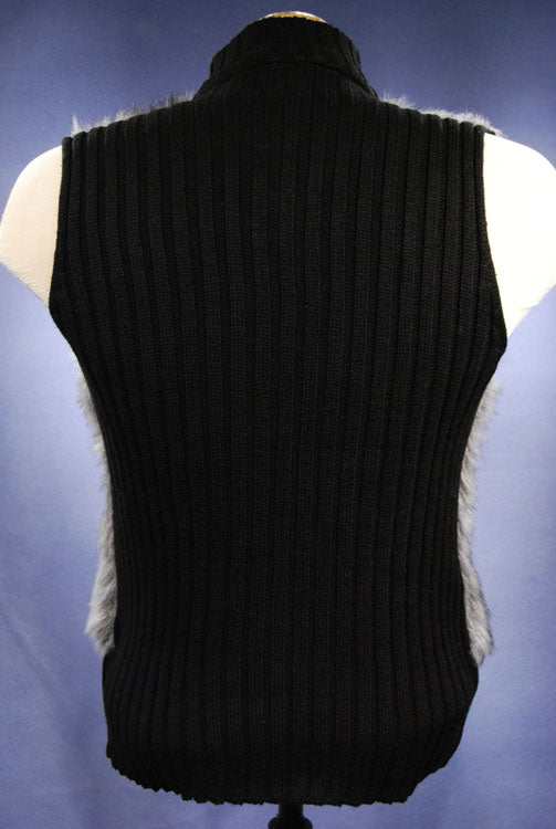 Back view of girl's/woman's grey and black faux-fur sleeveless sweater vest with rib-knit trim and zipper front