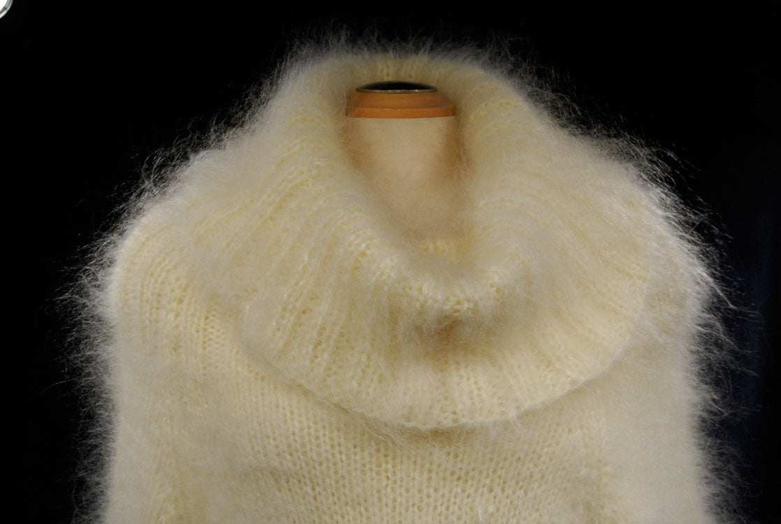 Creamy white hand-knit mohair large-cowlneck fuzzy sweaterdress on mannequin