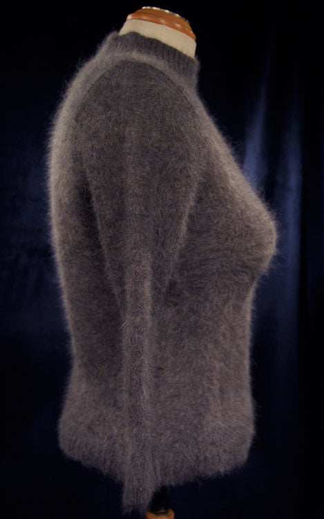 Woman's brownish-gray angora mock-turtleneck three-quarter sleeve sweater on mannequin